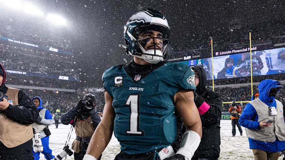 Jalen Hurts leads the Eagles through snowy conditions to a 28–22 Divisional Round victory over the Rams.